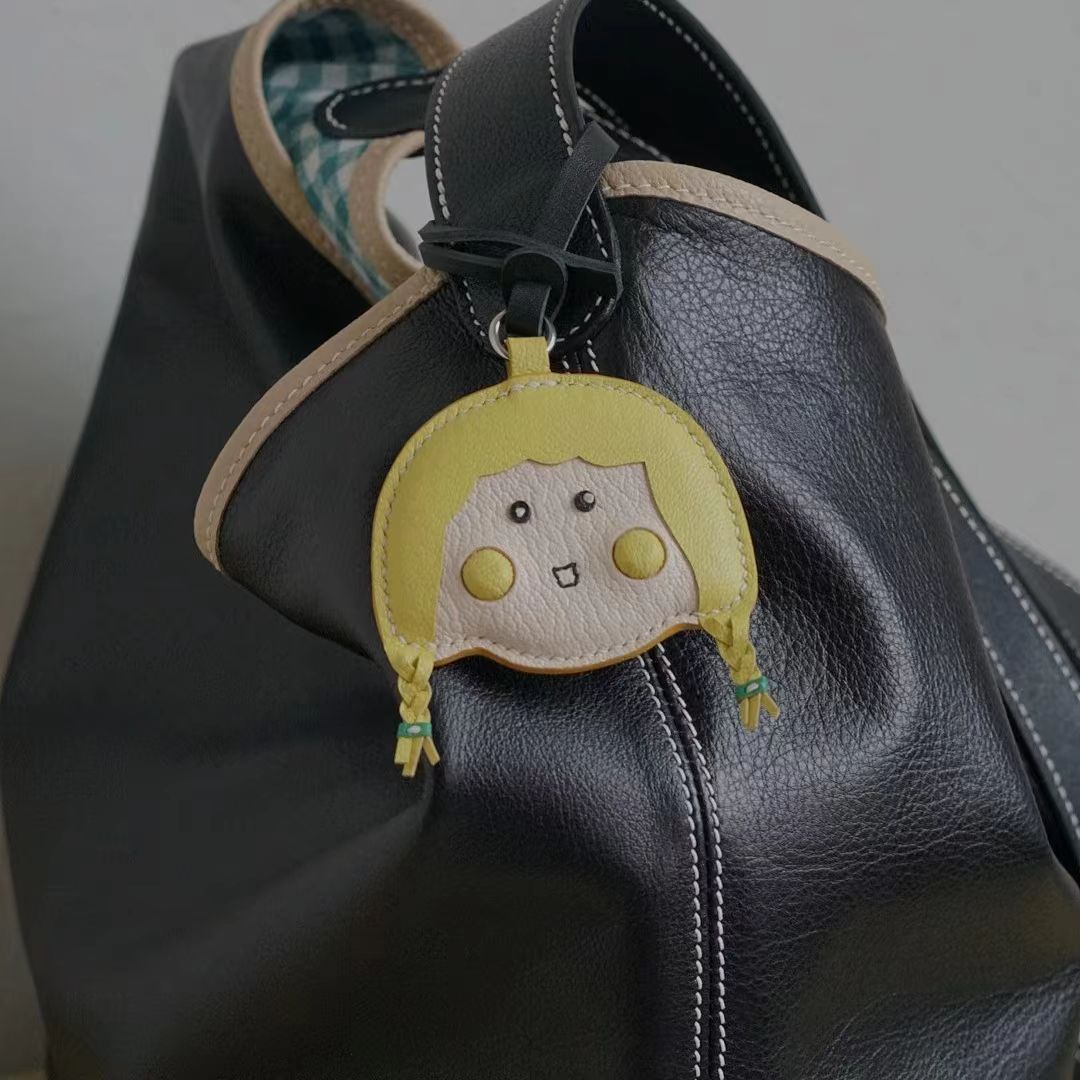 Braided dimple girl bag charm gift
keychain
birthday gift
Christmas gift