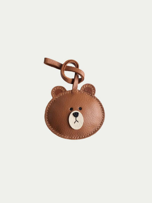 Handmade brown bear bag charm made from soft French lambskin leather on a white background
