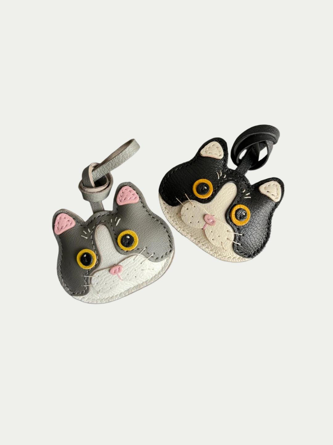 Close up of Rainbow Zoo Cat Charm showing meticulous stitching and soft leather texture