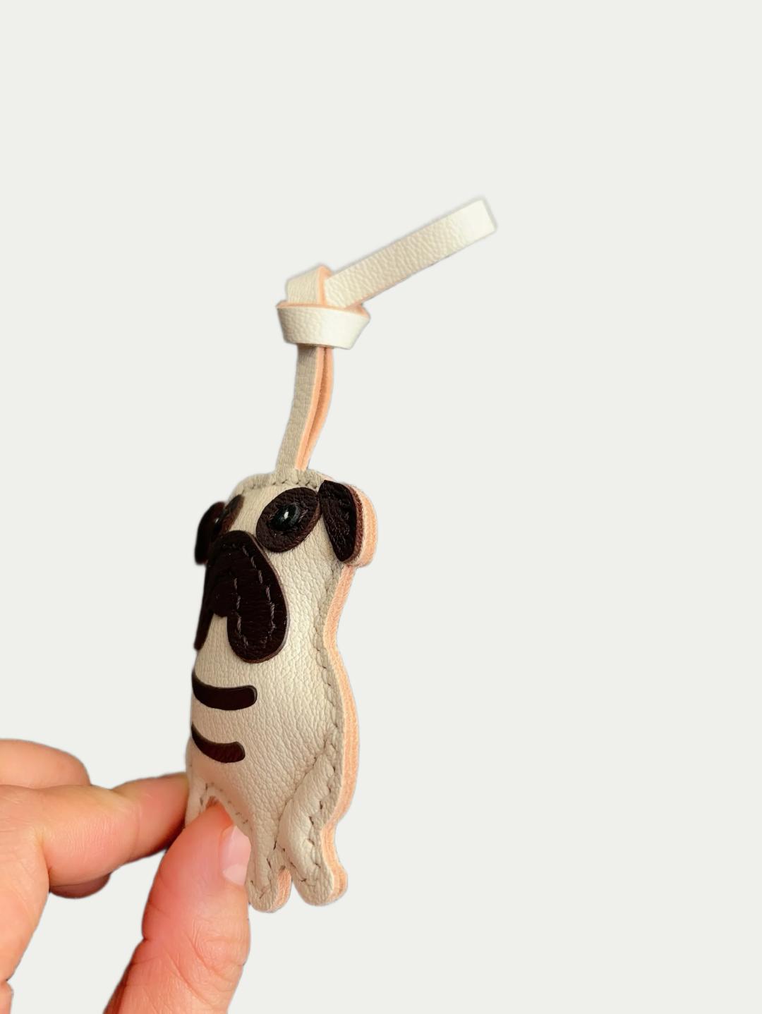 french Handmade Sheepskin Pug Bag Charm  Dog Lover Gift
French Handmade Sheepskin Pug Bag Charm
Artisanal French Lambskin Pug Purse Hanger
Luxury French Sheepskin Pug Bag Pendant 
Hand-stitched French Lambskin Pug Bag Charm for Dog Owners