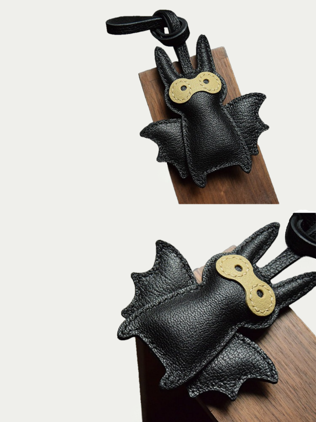 Close-up detail of the handmade bat charm showing the fine craftsmanship
