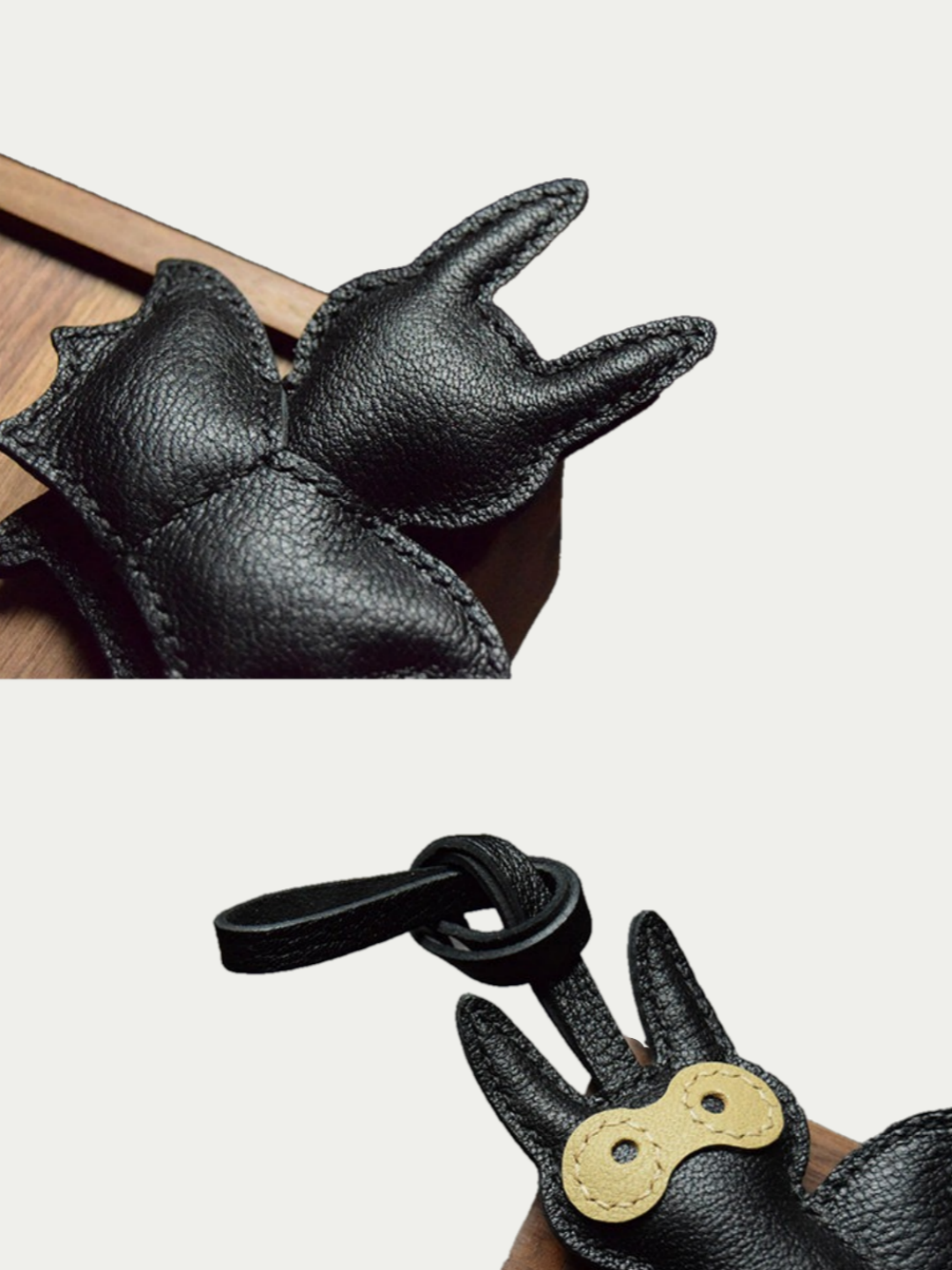 Close-up detail of the handmade bat charm showing the fine craftsmanship