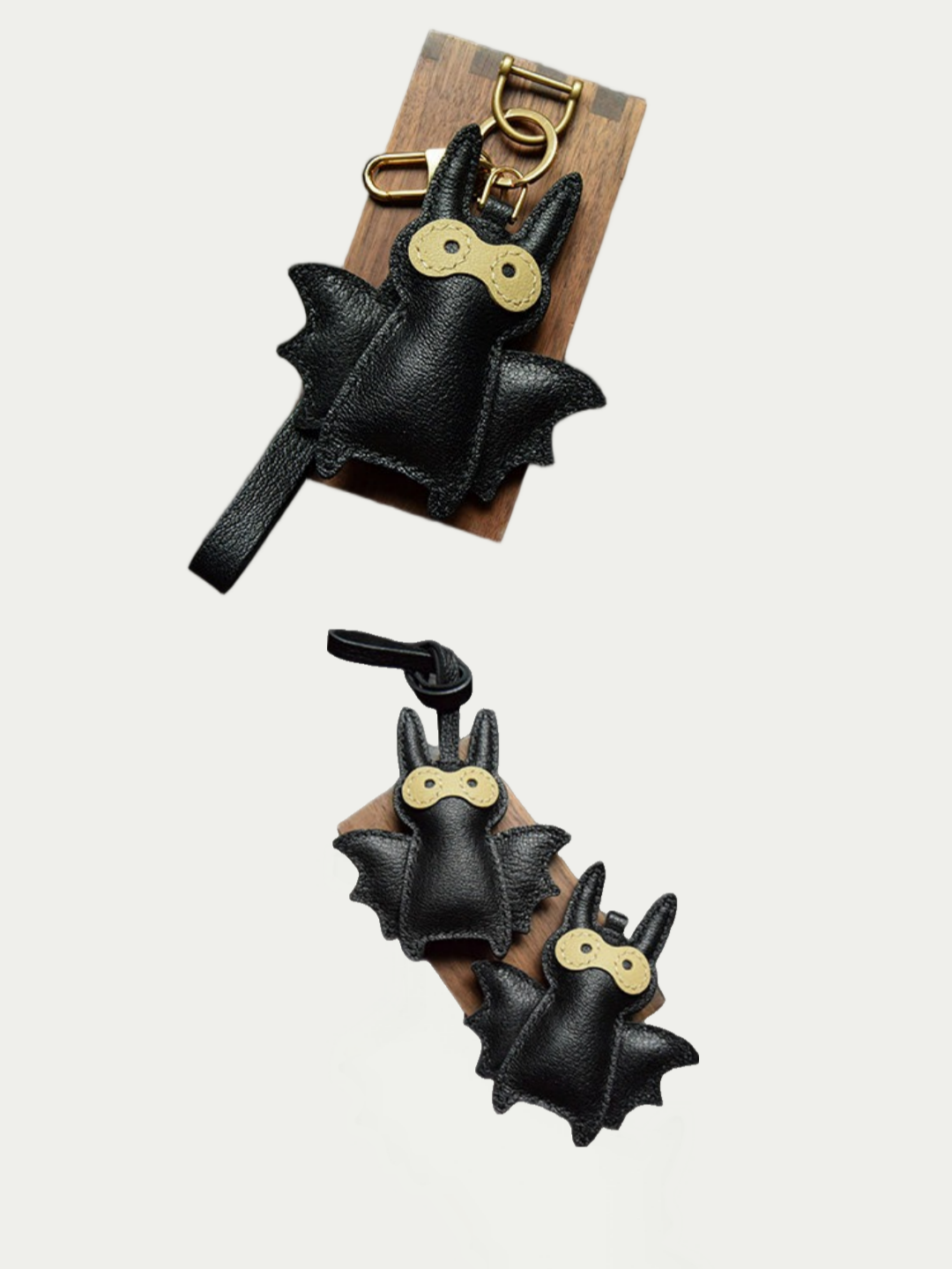 Close-up detail of the handmade bat charm showing the fine craftsmanship