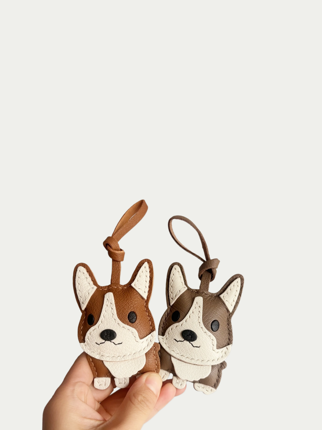 Handmade French sheep leather corgi dog charm on brown leather bag
