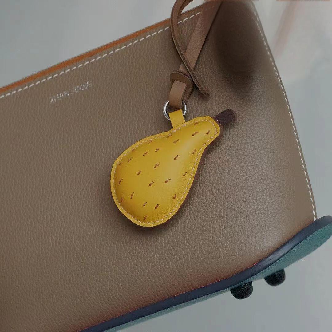 orange pear bag charm
fruit themed bag accessory gift
orange fruit keychain for bags
unique fruit bag charm birthday gift